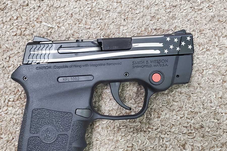 gun with laser engraving